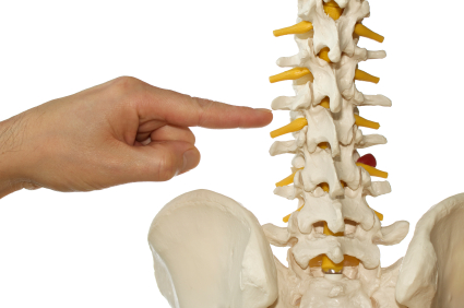 Hand pointing at spine